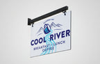 Cool River restaurant sign with mountain graphic on a white background