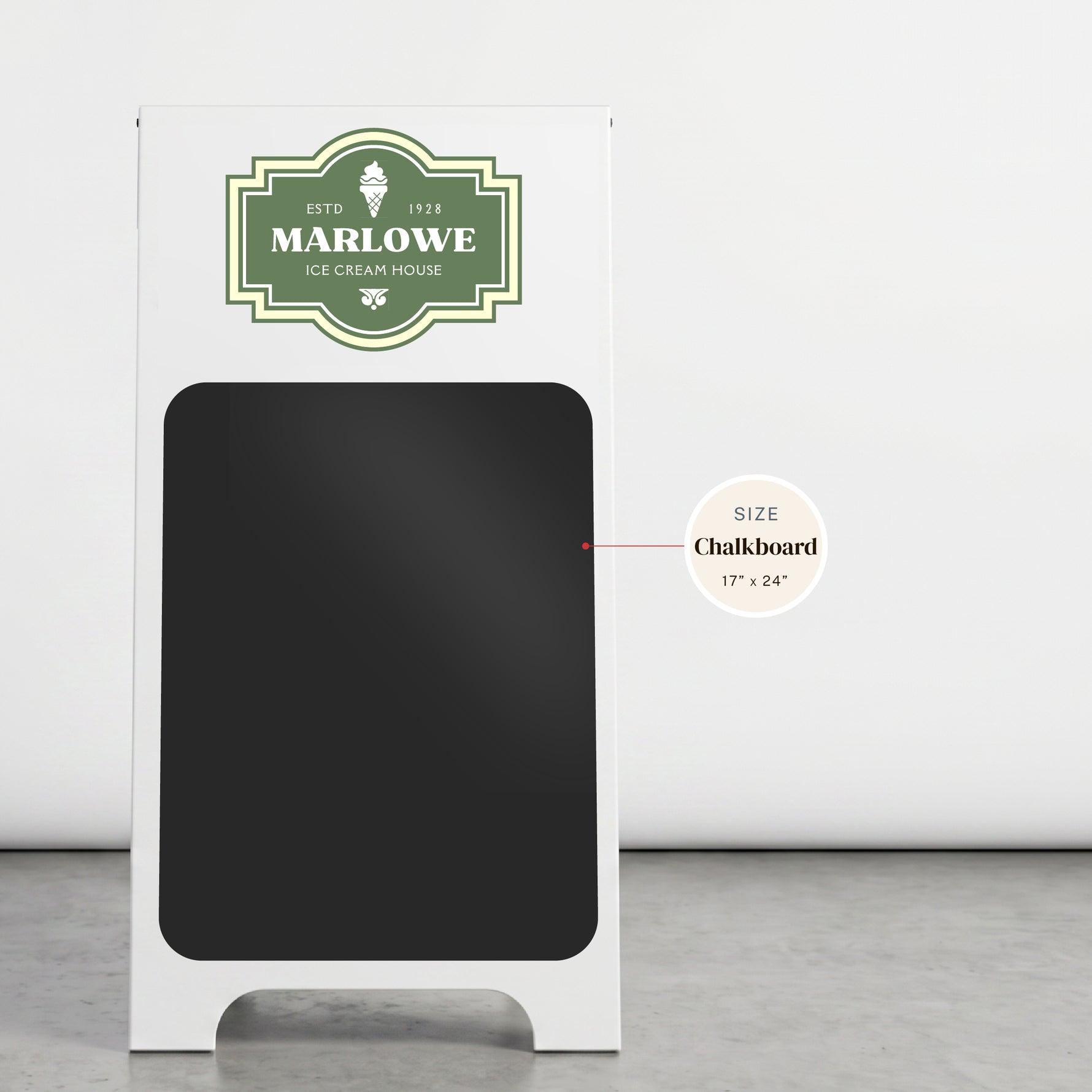 A white rectangular chalkboard sign, shown against a light gray wall and floor. The front has a large black chalkboard panel with a green decorative MARLOWE ICE CREAM HOUSE logo at the top.