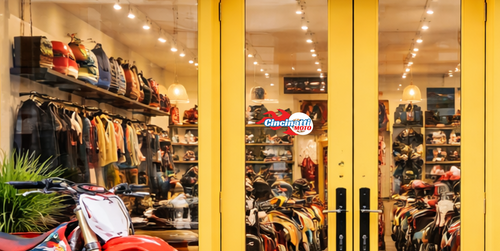 Clothing store with yellow doors and colorful door decal