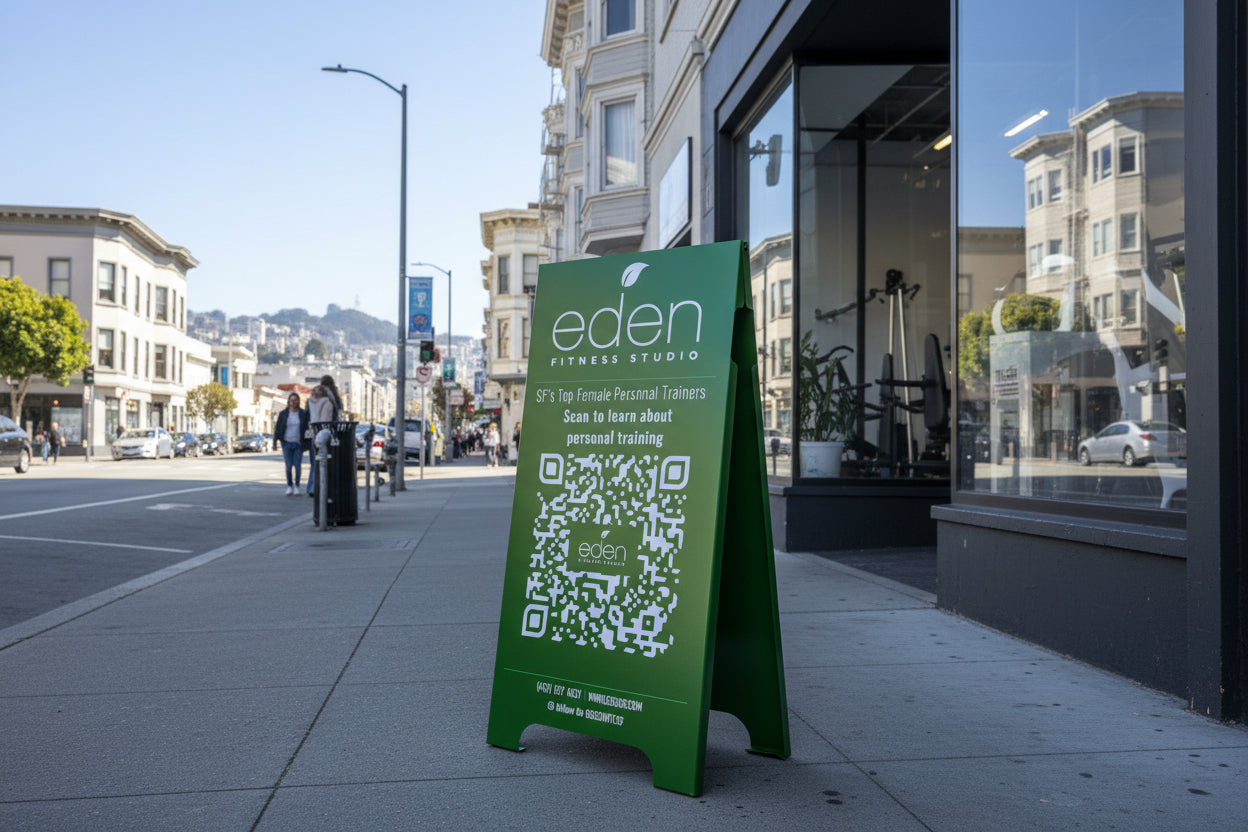 Eden Fitness green metal sidewalk sign with QR code